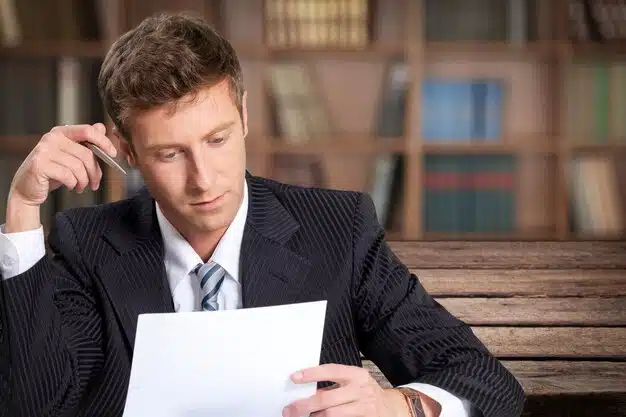 a business man reading cra notice